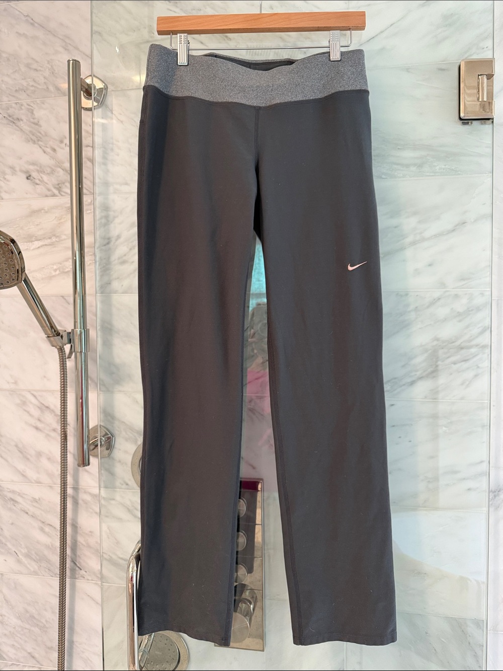 Nike women’s charcoal Gray Waistband and Pink Swoosh